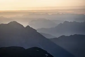 Evening mood, silhouettes, dramatic mountain landscape