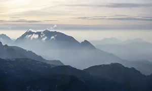 Evening mood, silhouettes, dramatic mountain landscape