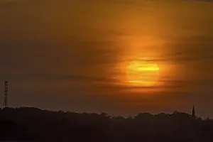 Evening sun veiled by clouds, Schonberg