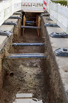 Excavation pit with safety barriers