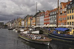 Excursion boat at the busy Nyhavn Canal