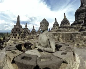Category Buddhism Prints: Exposed Buddha statue in the temple complex of Borobudur