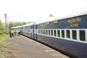 Category Historic EN Prints: Express train waiting on non stopping railway station people standing on platform
