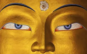 Eyes of Maitreya Buddha face close up