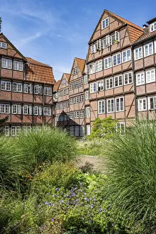 Framed Print : Facades of the historic brick buildings
