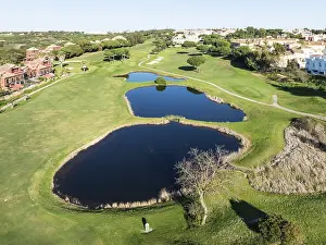 Fairway framed by housing estates at the Islantilla Golf Resort