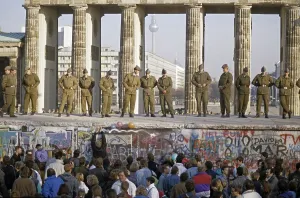 Fall of the Berlin Wall: border guards of the National Army securing the Wall at the Brandenburg Gate