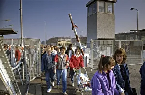 Fall of the Berlin Wall: citizens from East Berlin pass the checkpoint Bornholm Bridge