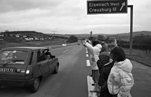 Fall of the Berlin Wall, East Germans waving at West Germans