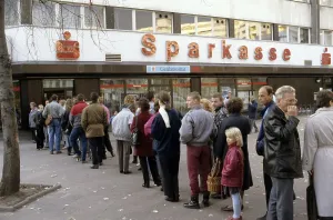 Fall of the Berlin Wall: queue for the welcome money at a bank in East Berlin