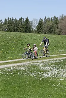 Family on a bicycle ride near Koenigsdorf