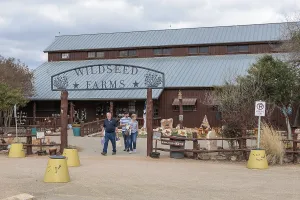 Family leaving the Wildseed Farms nursery in Fredericksburg