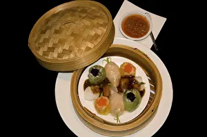 The famous Cantonese array of choice morsels known as dim sum (or)