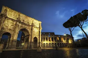 Famous Colosseum and arch of constantine taken at night when the structures are still lit up