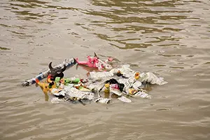 Farewell of the Durga Idol into the water of River Hooghly - Visarjan