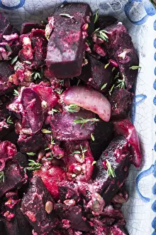 Farmers food, beetroot bake with fresh thyme on wooden table