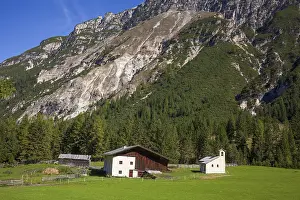 Framed Print : Farmhouses and chapel on the Issenangeralm in autumn