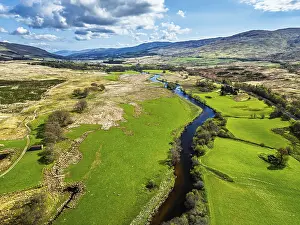 Farms and Mountains over River Dochart and Road A85 from a drone