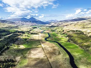 Farms and Mountains over River Dochart and Road A85 from a drone