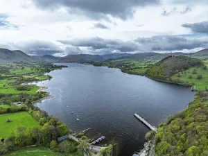 Framed Print : Farms and mountains over Ullswater Lake from drone