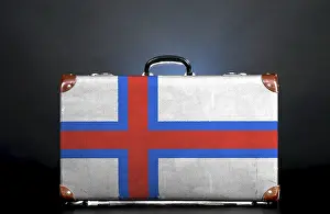 The Faroe Islands flag on a suitcase for travel