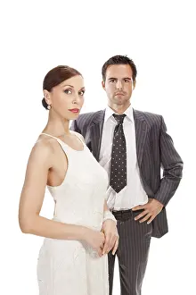 Fashion couple, studio shot. Isolated on white background