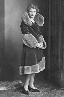 Fashion, Woman in Coat with Fur Trimming