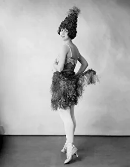 Fashion, woman with feather skirt