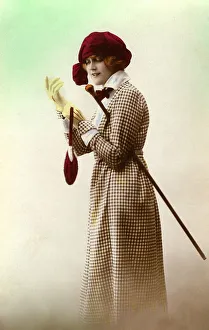 Fashion, woman with hat, dress and stick