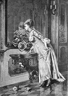 Favorite flower, fine lady smells a bouquet of flowers standing in front of a mirror