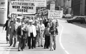 Fear of losing their jobs due to the merger of Hoesch AG with the Dutch steel company Hoogovens drove the steelworkers