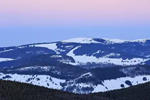 Feldberg with snow at sunset, view from Belchen