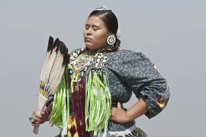 Female dancer in jingle dance regalia