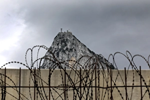 Category Mountain Landscapes Prints: Fence on Spanish territory, just in front of the British territory of Gibraktar