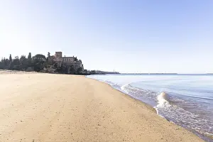 Ferragudo Castle is located on a sandy beach in a harbour bay