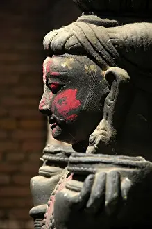 Figures with red coloured cheeks Royal Palace Bhaktapur Nepal