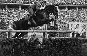 First lieutenant Kurt Hasse (Germany) on Tora won the big hunt jumping competition