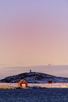 Category Scandinavia Prints: Fisherman's cottage beside a fjord with wintry mountains