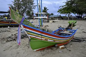 Fishing boat on the beach of Chathing Phra