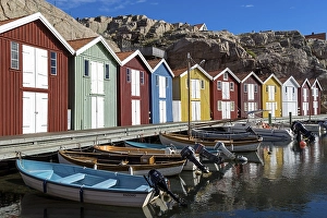 Fishing boats and colourful boathouses