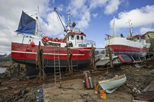 Fishing boats in a dry dock, sound
