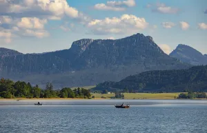 Fishing boats at the Irrsee, behind it Schober
