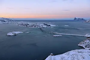 Fjord with islands and a bridge during the blue hour