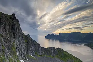 Fjord and mountains, mountain range Okshornan in the back