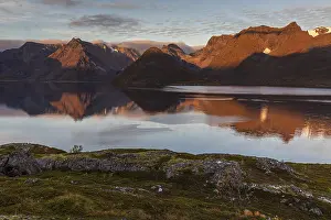Fjord with steep mountains in autumn