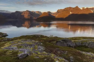 Fjord with steep mountains in autumn