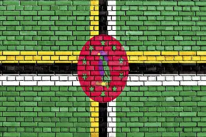 Flag of Dominica painted on brick wall