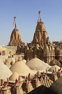 Flags and detail reliefs on rooftops of Jain temple in Jaisalmer