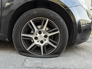 A flat tyre on a car, Wuppertal, Germany