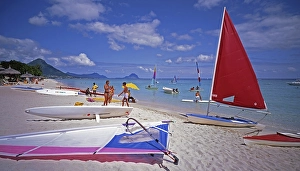 Flic en Flac beach at the Hotel Piroque, surfers, surfboards, sailing boats, Mauritius Island, Indian Ocean